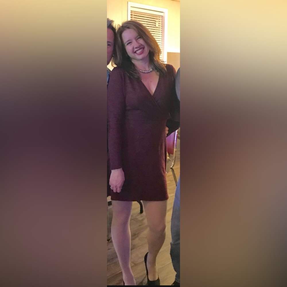 Burgundy knit dress with a lace appliqué. Perfect for dinner or an event.